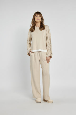 Stylowy komplet dresowy z bluzą ze sznurowanymi rękawami