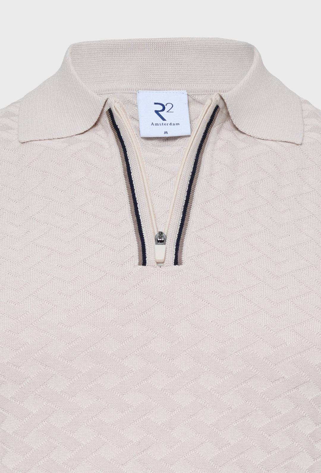 Beżowa dzianinowa koszulka polo z ozdobnym suwakiem