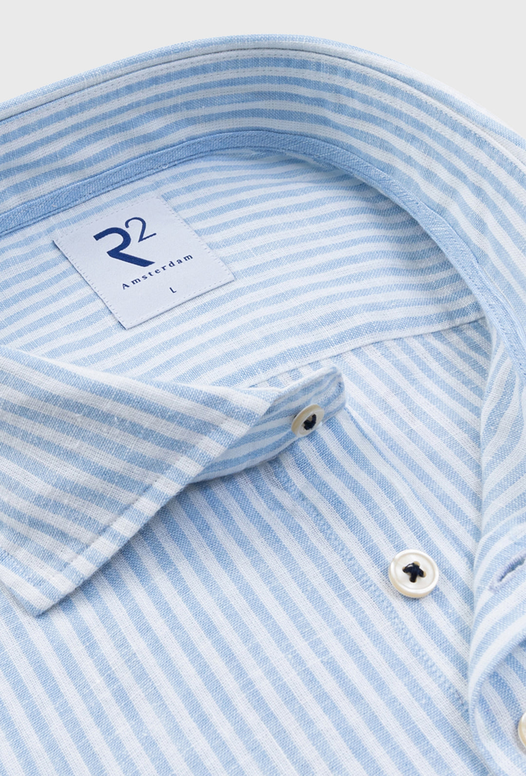 Niebieska koszula męska w szerokie pionowe pasy