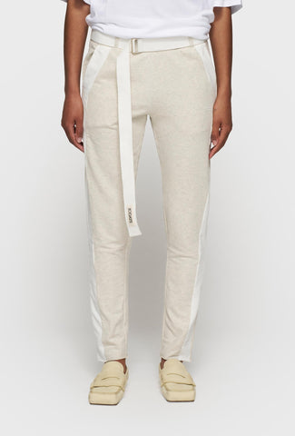Dresowe spodnie w kolorze ecru ze stylowymi, białym naszyciami