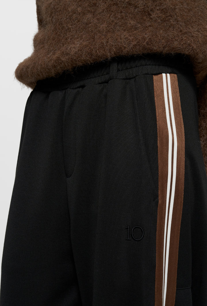 Czarne szerokie spodnie z lampasami w odcieniach brązu