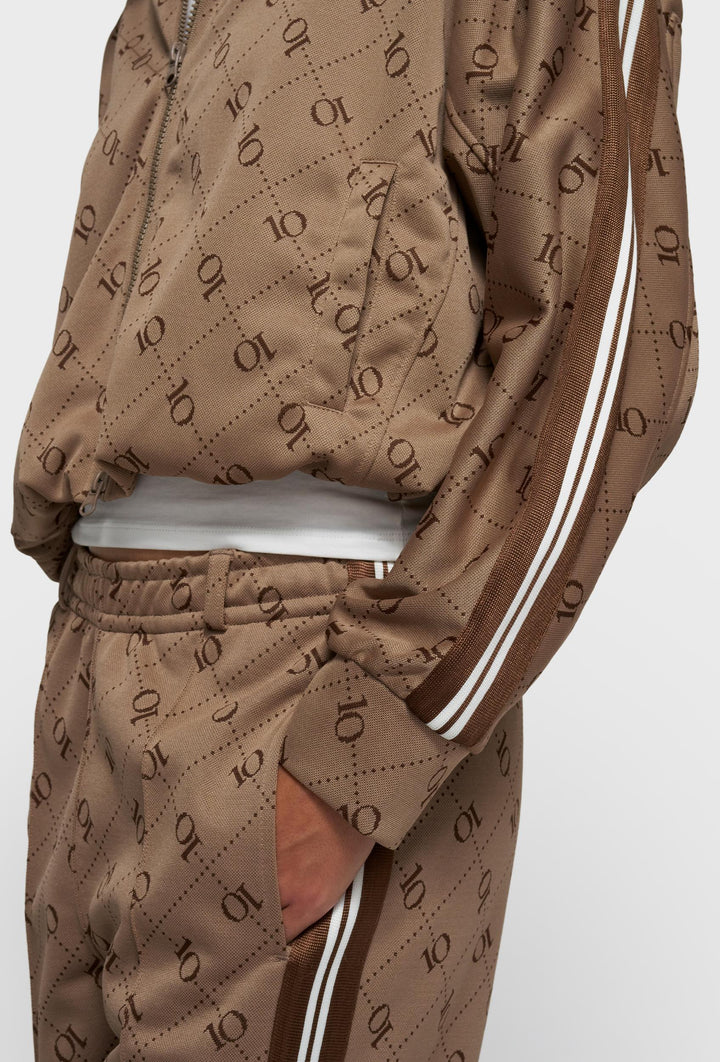 Brązowe spodnie z monogramem i lampasami w stylu retro