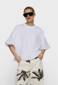 Oversizowa bluzka w białym kolorze z krótkim rękawem