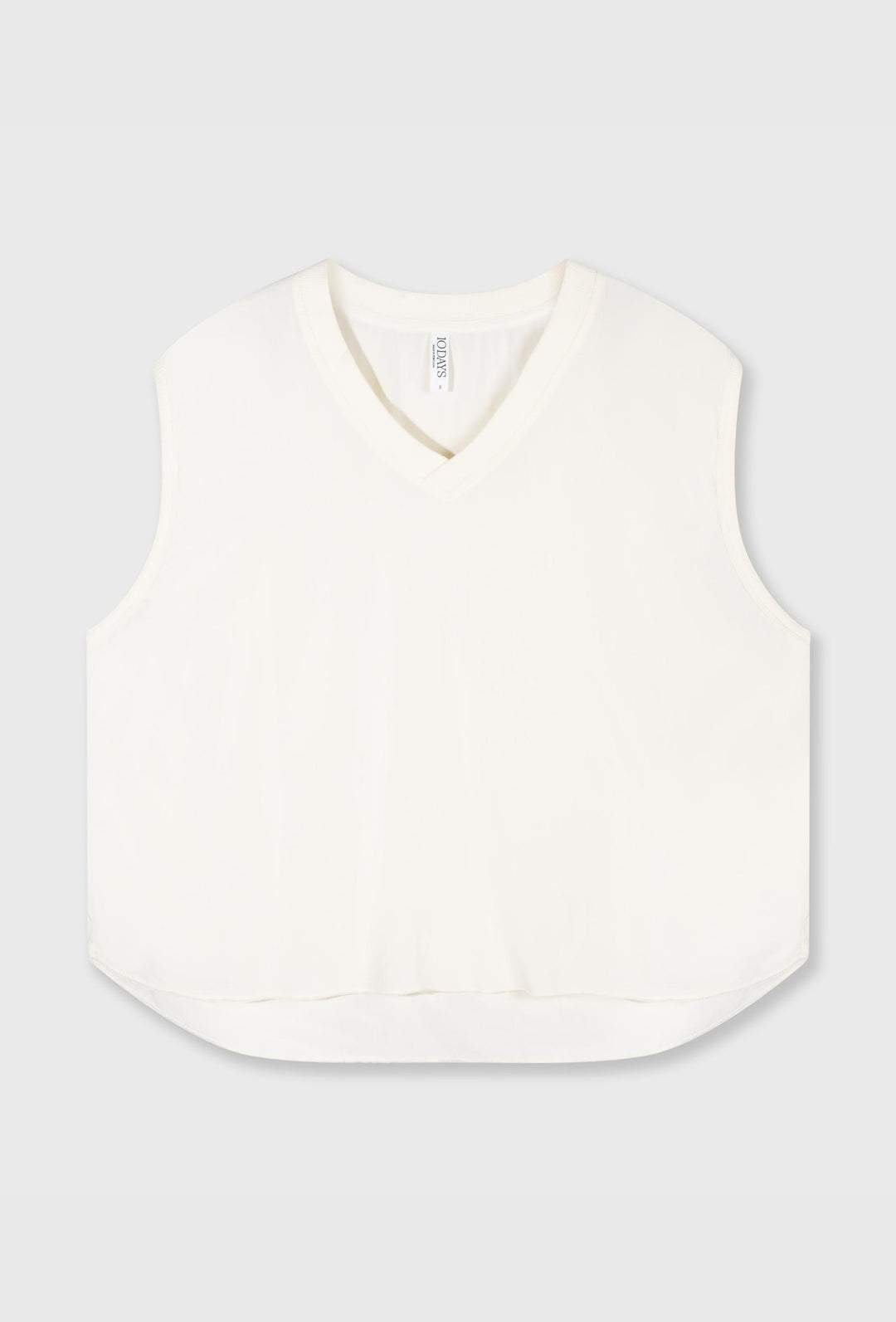 Lekki, oversizowy top na szeokich ramiączkach w kolorze ecru