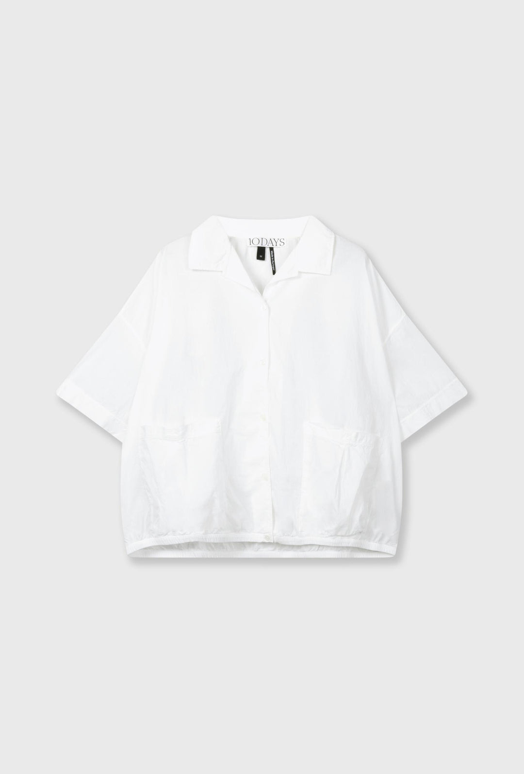 Biała koszula oversize z krótkim rękawem