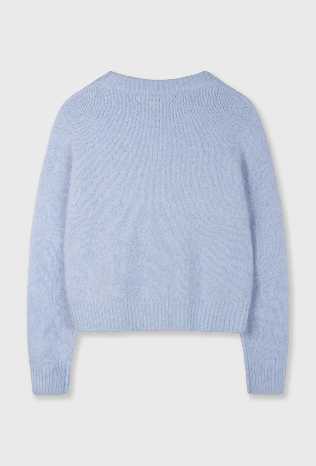 Błękitny sweter z grafitowymi spodniami culotte
