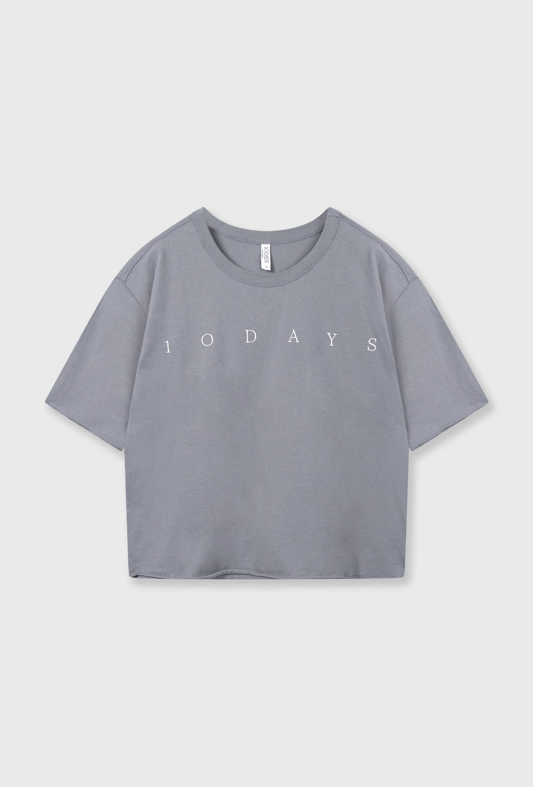 Szary bawełniany t-shirt oversize z białym napisem