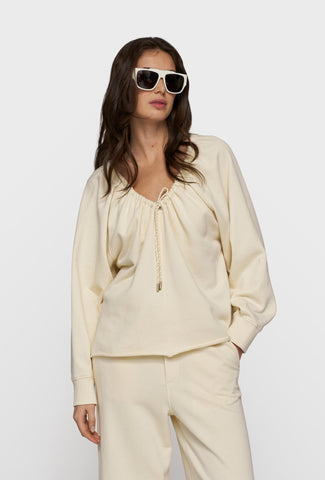 Kremowa bluza nierozpinana  z wiązaniem
