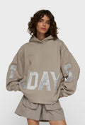 Bluza oversize z kapturem i metalicznym napisem
