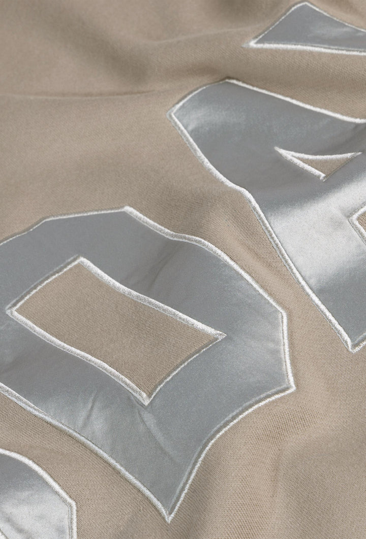Bawełniana bluza oversize z kapturem i metalicznym napisem taupe