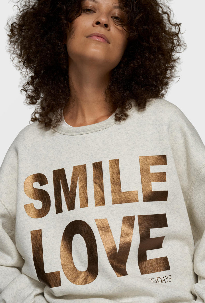 Beżowa bluza z metalicznym nadrukiem SMILE LOVE