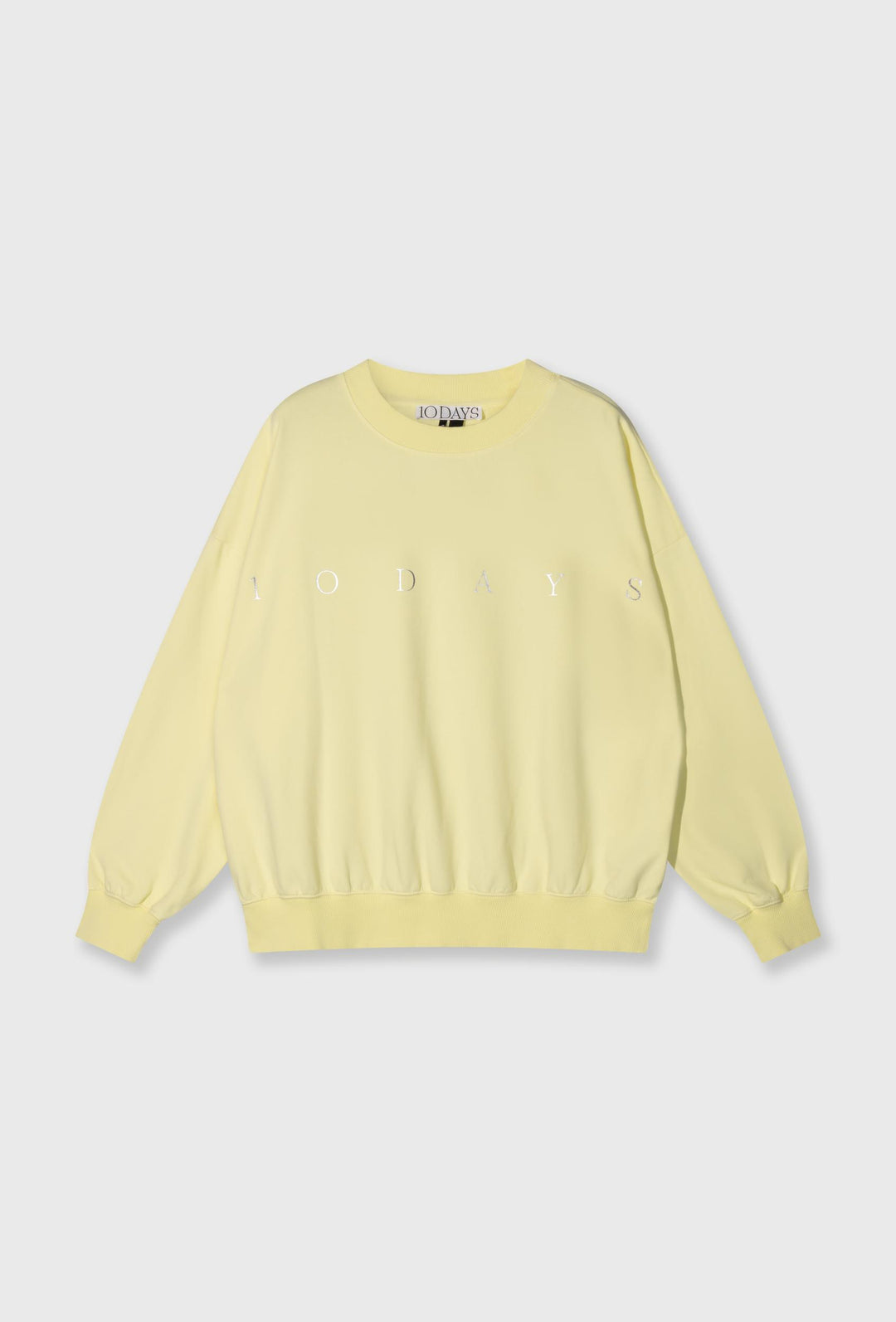 Nierozpinana bluza w pastelowym żółtym kolorze