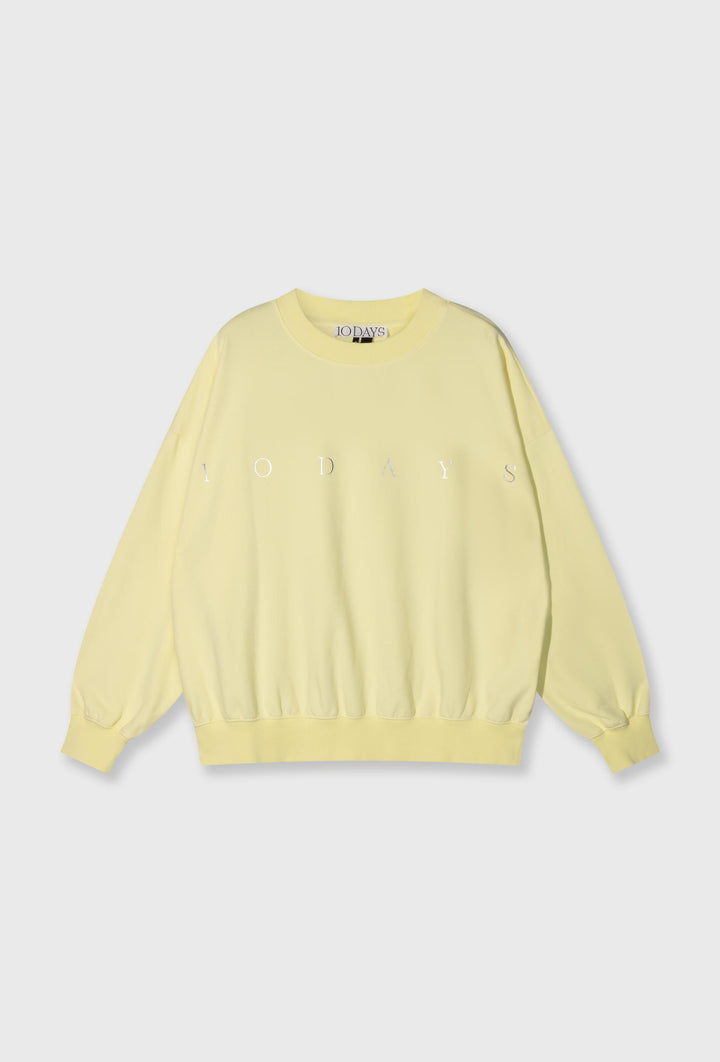 Nierozpinana bluza w pastelowym żółtym kolorze