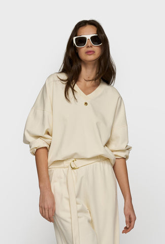Oversizowa, minimalistyczna bluza w kremowym kolorze