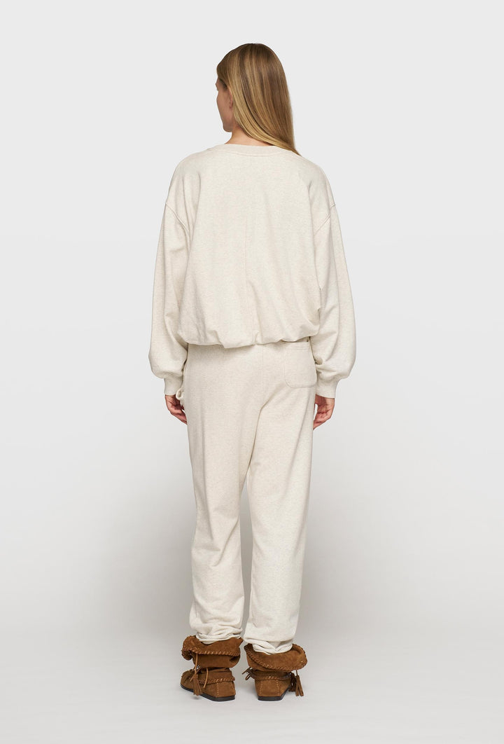 Bluza w kremowym kolorze o luźniejszym fasonie