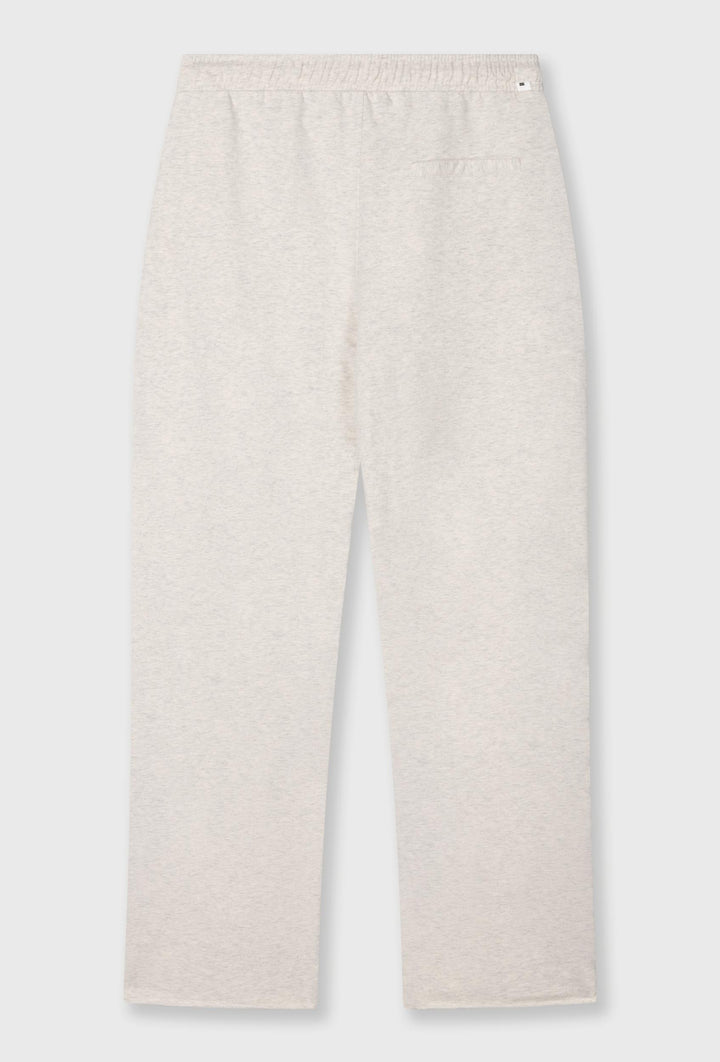 Spodnie dresowe z lekko rozszerzaną nogawką w kolorze ecru