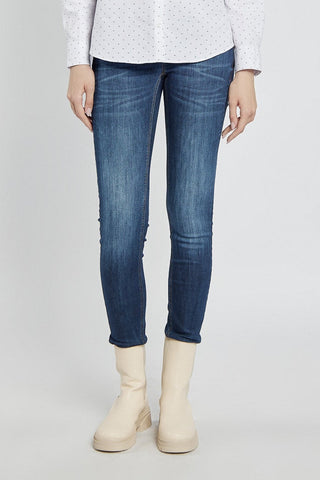 Granatowe dżinsy z przetarciami