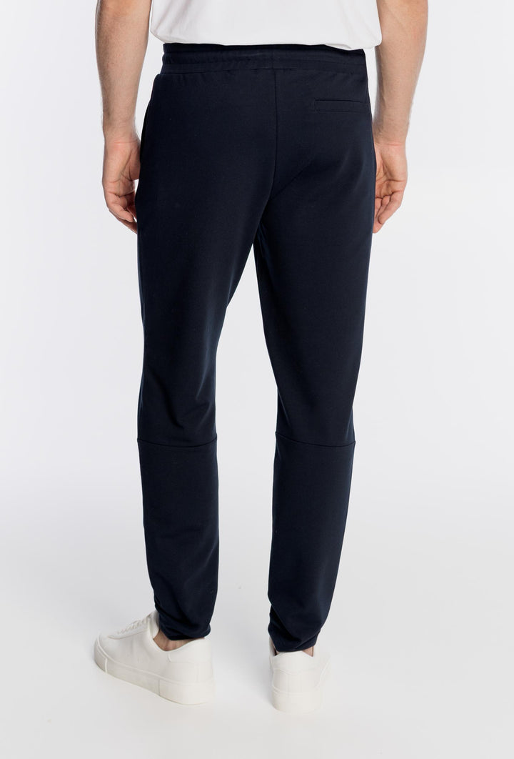 Granatowe męskie spodnie dresowe z logo Campione