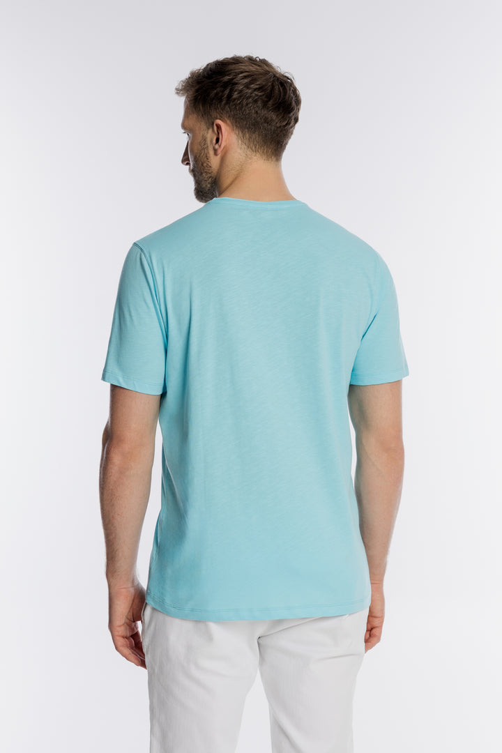 Męski jasnoniebieski T-shirt Campione z naszywaną kieszonką