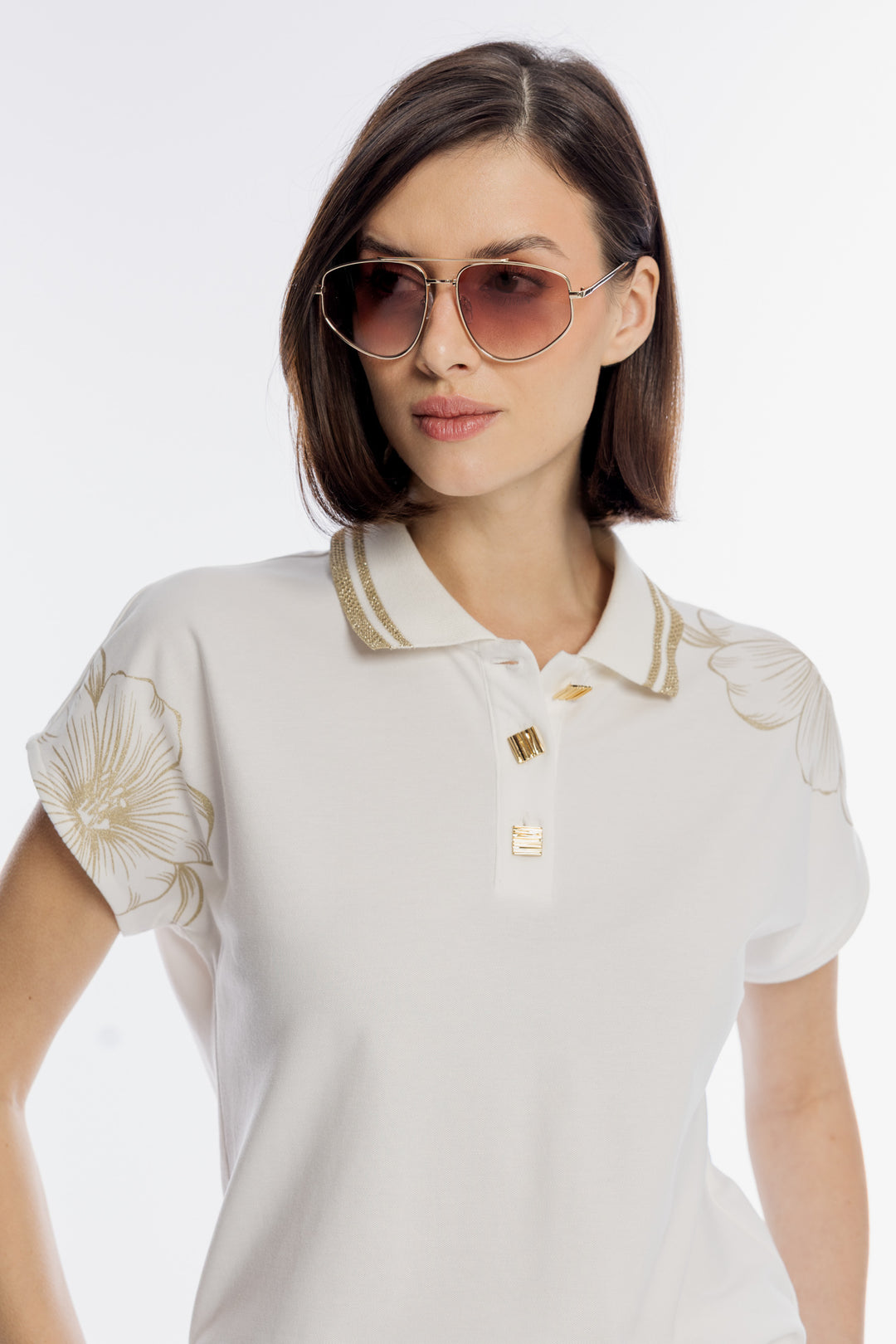 Biała bluzka polo ze złotym kwiatowym haftem