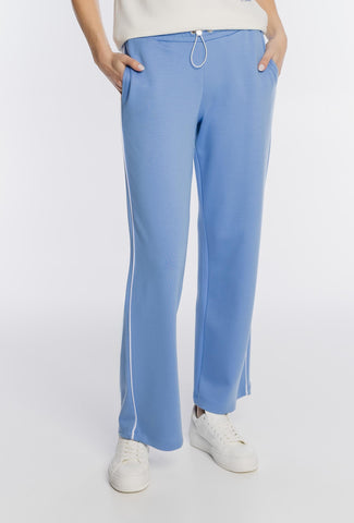 Błękitne spodnie dresowe z białym haftem i lampasami