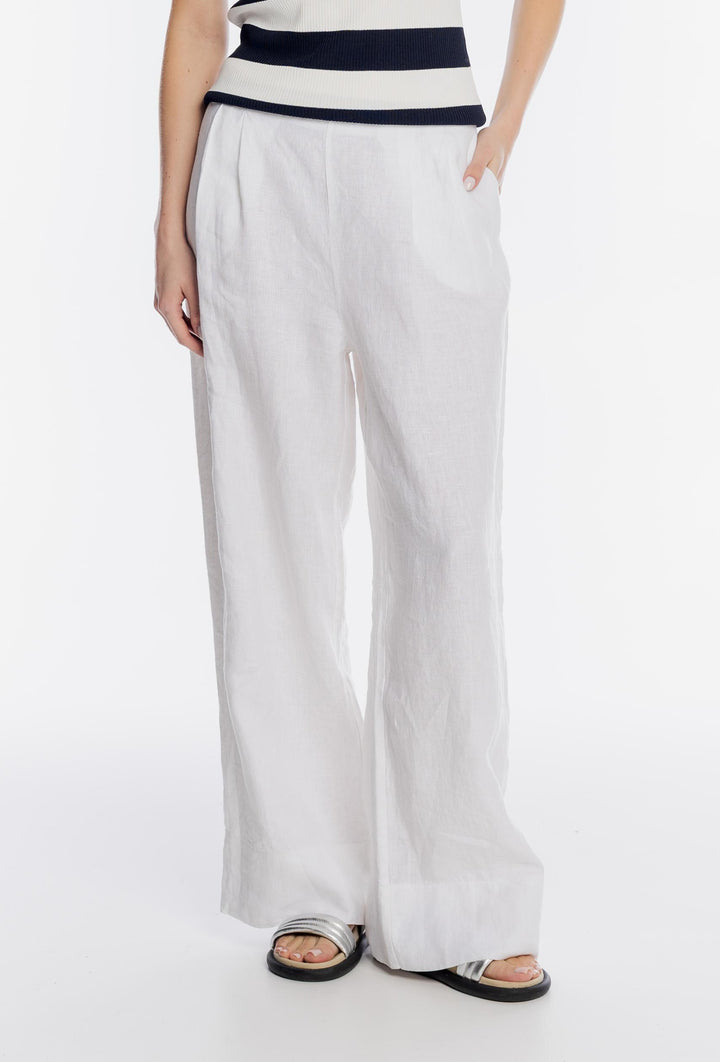 Białe lniane spodnie damskie z szerokimi nogawkami