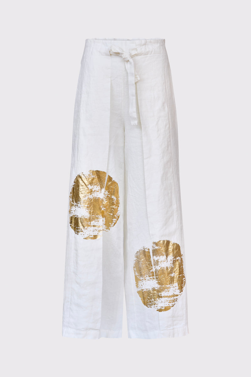 Białe lniane spodnie z szerokimi nogawkami i złotym nadrukiem