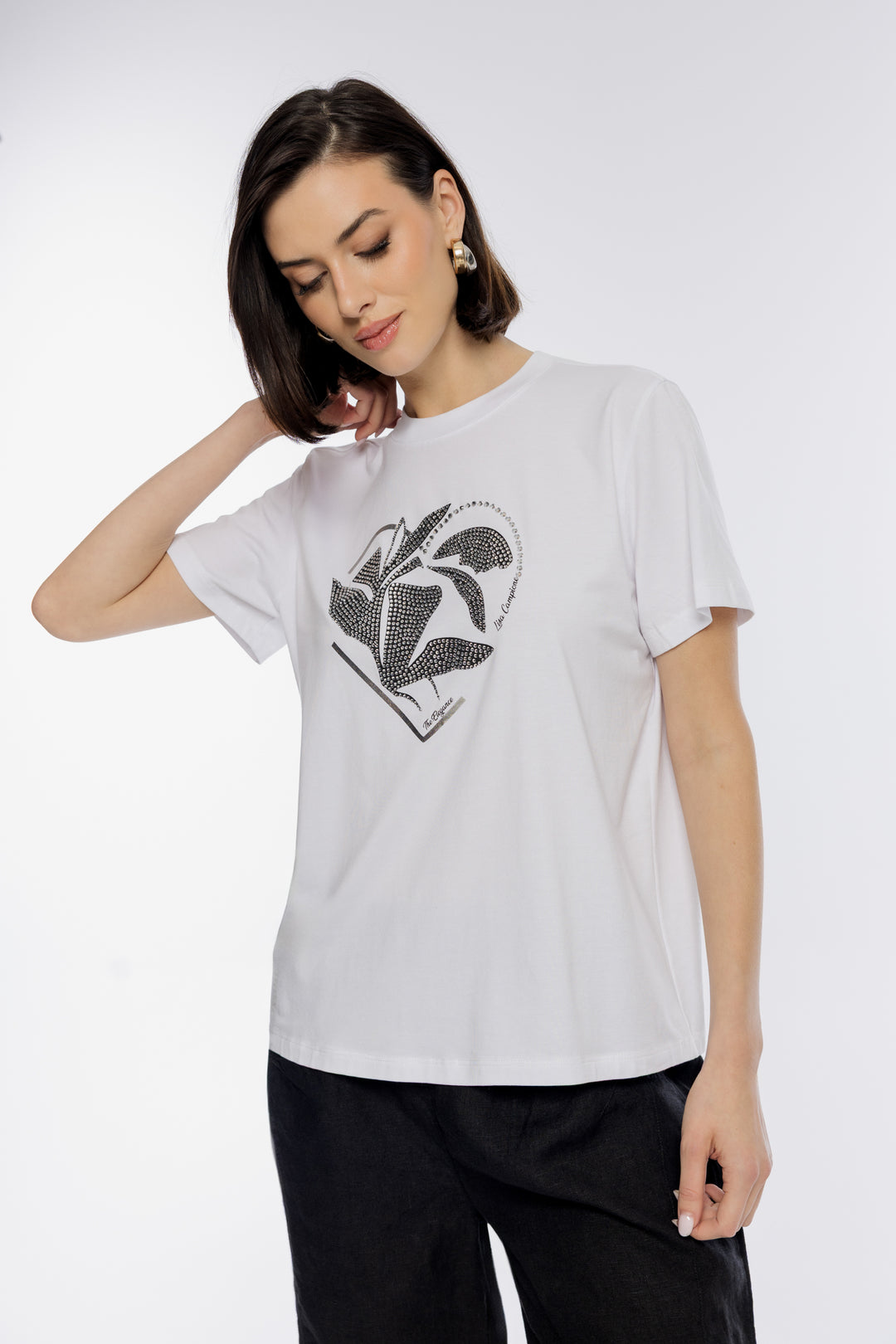 Biały T-shirt z ozdobną aplikacją i motywem liścia