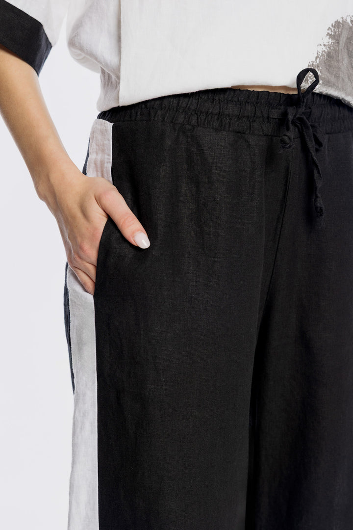 Szerokie lniane spodnie z kontrastowym białym lampasem