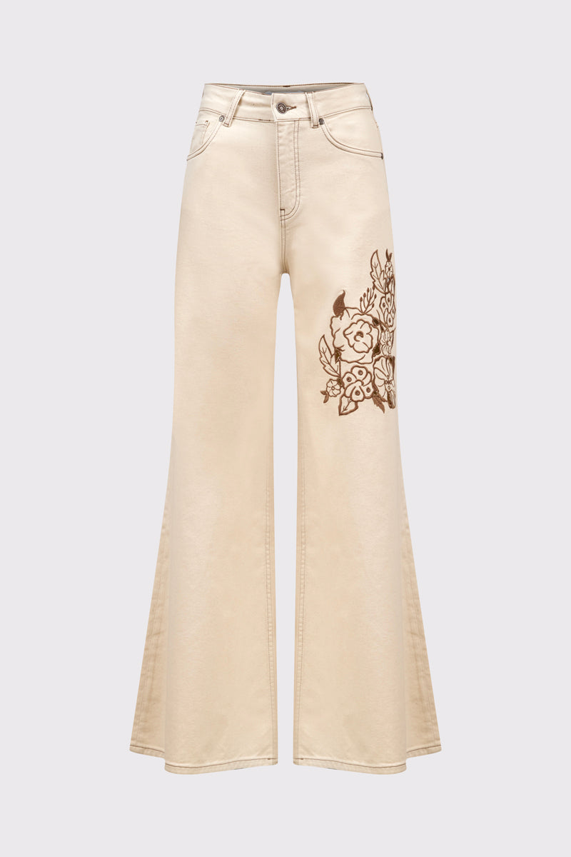 Beżowe spodnie z szeroką nogawką i haftem