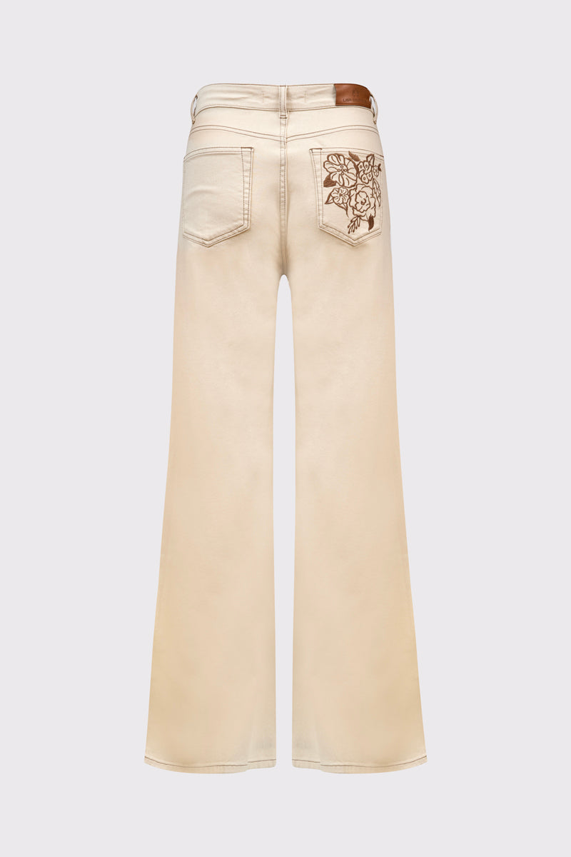 Beżowe spodnie z szeroką nogawką i haftem