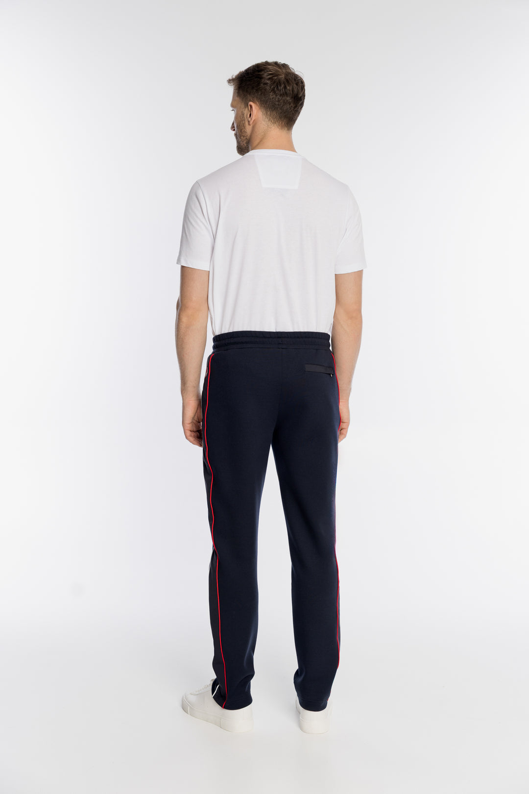 Granatowe męska spodnie dresowe Campione z lampasami