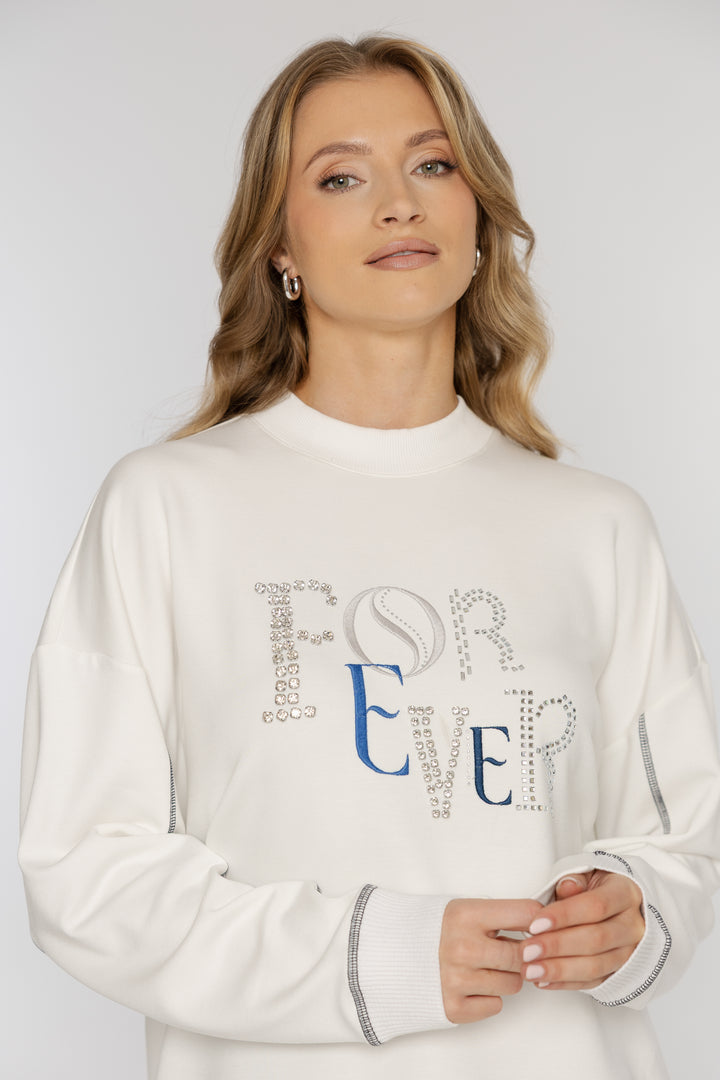 Kremowa bluza z ozdobnym napisem „FOREVER”